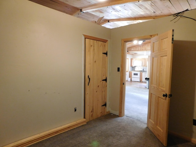 interior space with lofted ceiling with beams and wood ceiling