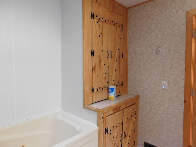 bathroom featuring a tub