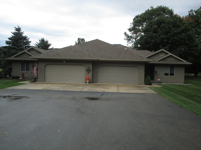 ranch-style home with a garage