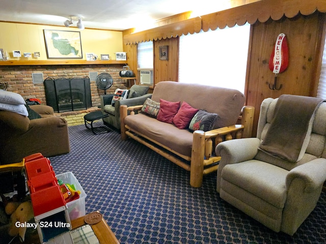 carpeted living room featuring a fireplace