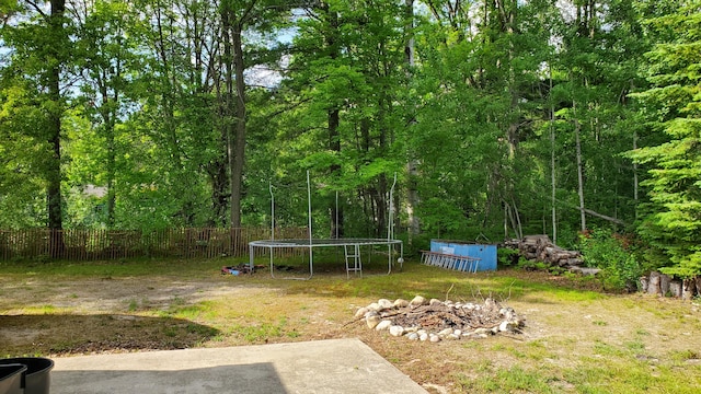 view of yard with a trampoline