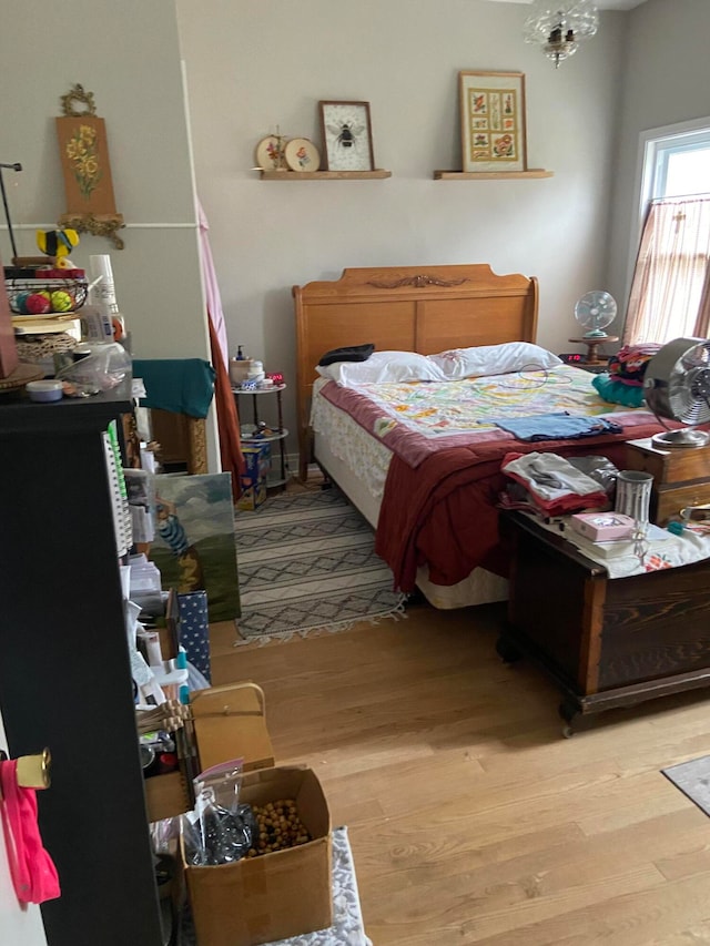 bedroom with light wood-type flooring