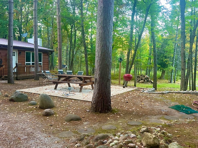 view of property's community featuring a patio