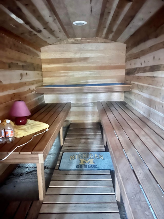 view of sauna / steam room featuring wood walls and hardwood / wood-style floors