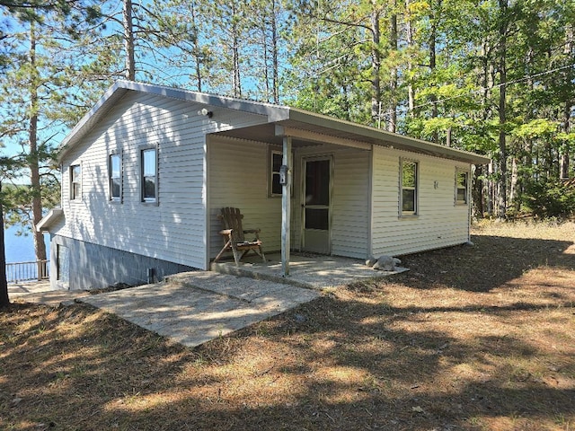 back of house featuring a patio area