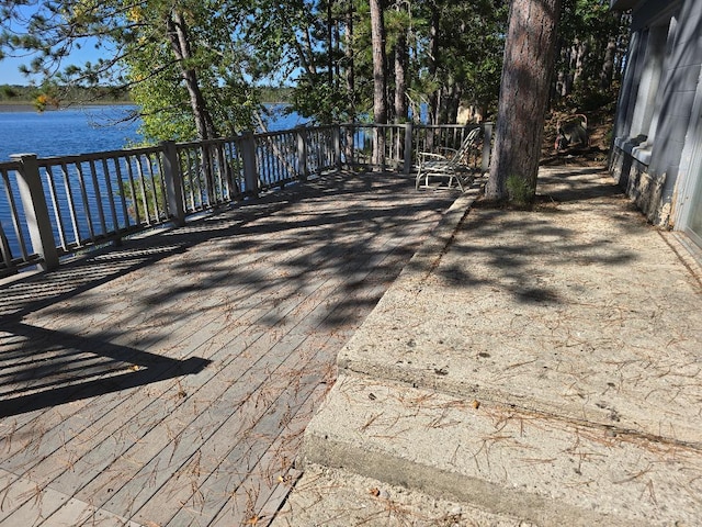 deck featuring a water view