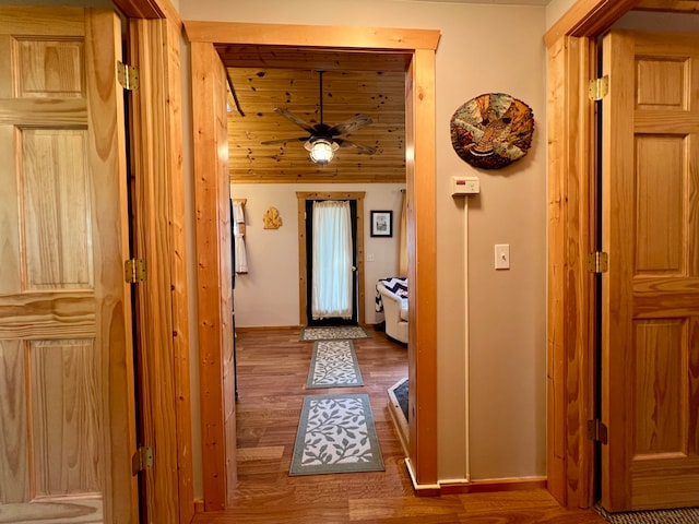 corridor featuring hardwood / wood-style floors