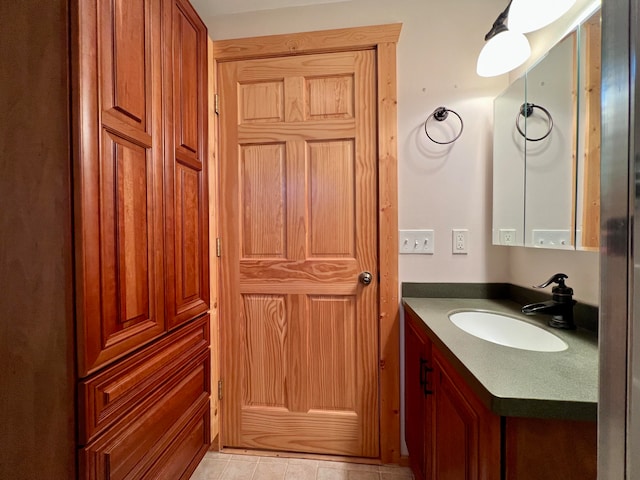 bathroom featuring vanity and tile patterned floors