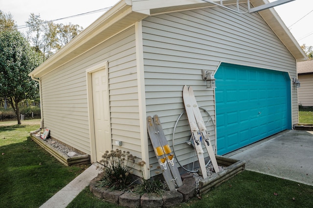 exterior space with a lawn and a garage