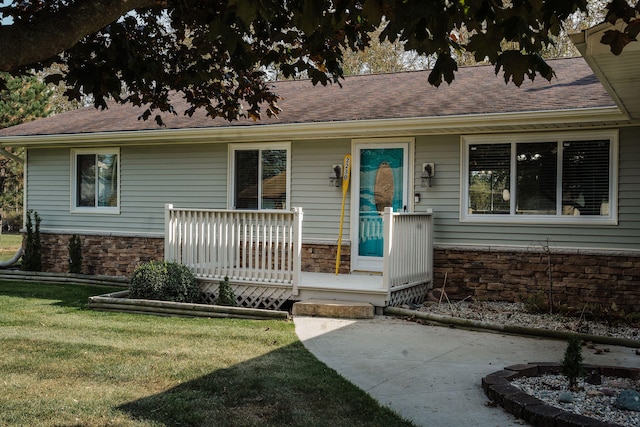 ranch-style home with a front yard