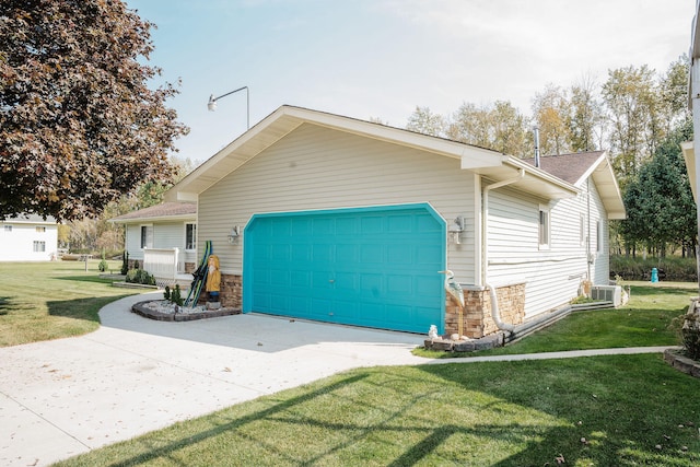 view of property exterior featuring a yard and a garage