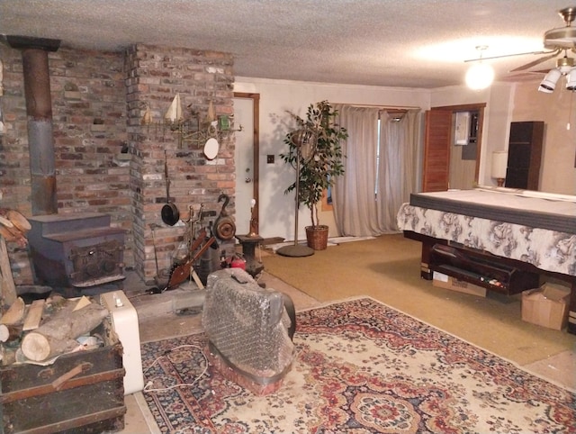 bedroom featuring a textured ceiling and ceiling fan