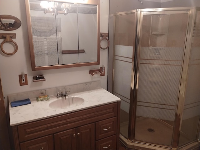 bathroom featuring vanity and walk in shower