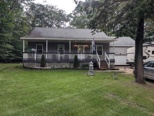 view of front facade with covered porch and a front lawn