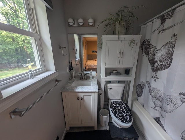 bathroom with vanity and shower / bath combo