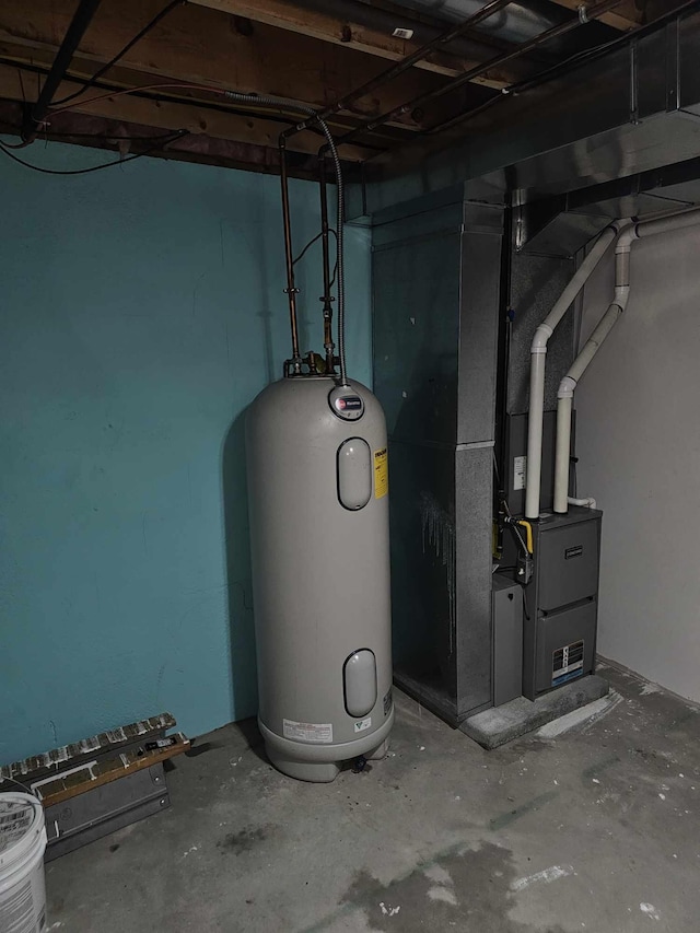 utility room featuring electric water heater