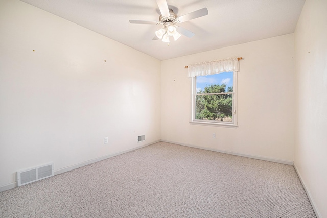 unfurnished room featuring visible vents, ceiling fan, light carpet, and baseboards