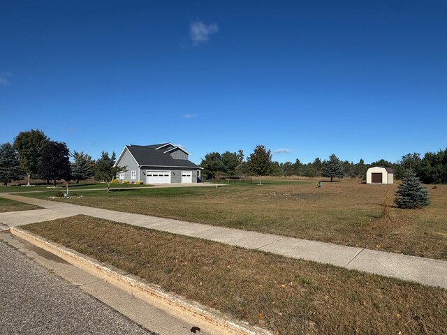 view of outbuilding with a yard