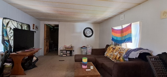 living room featuring carpet and plenty of natural light