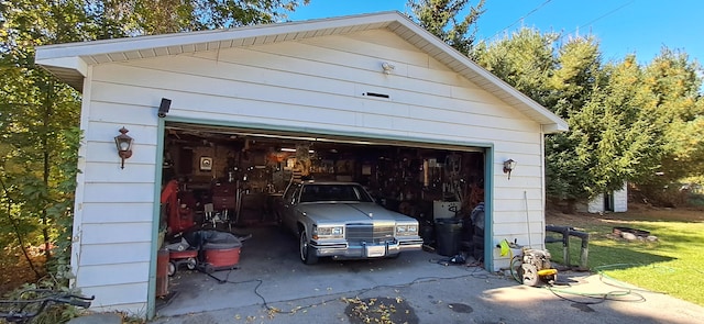 garage featuring wood walls