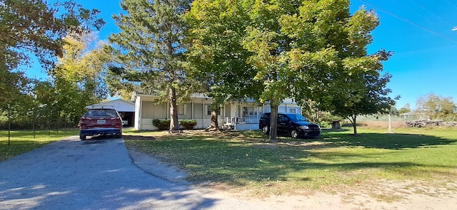 view of front of home with a front yard