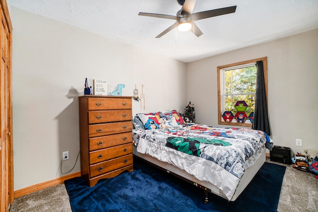 bedroom featuring carpet flooring and ceiling fan