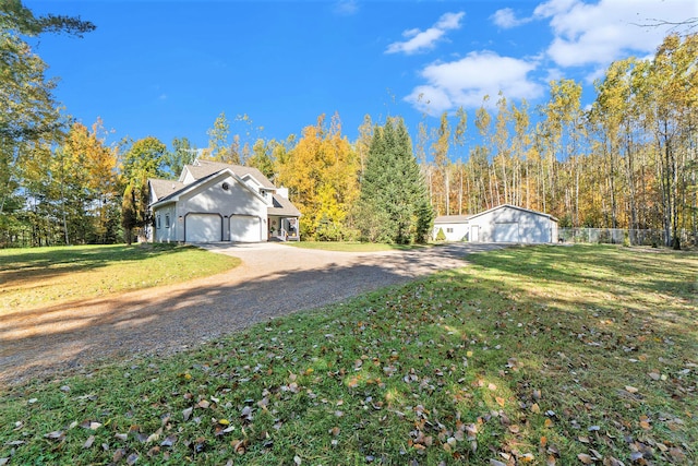 view of yard featuring a garage