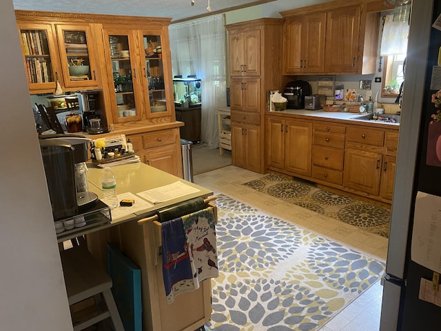 kitchen featuring stainless steel refrigerator