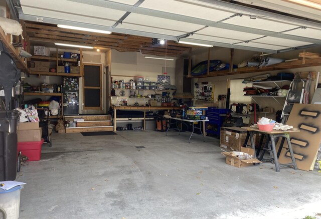 garage with a workshop area