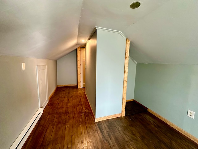 additional living space with lofted ceiling, a baseboard radiator, and dark hardwood / wood-style flooring