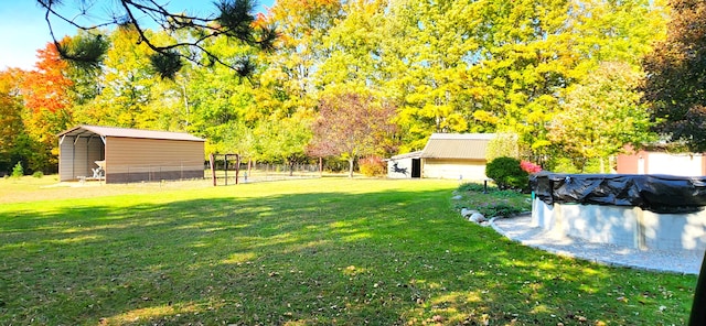 view of yard with a carport