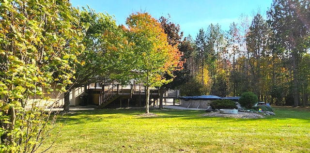 view of yard featuring a deck