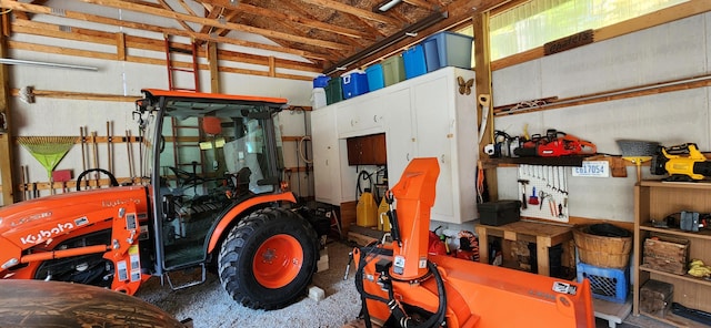 garage with a workshop area