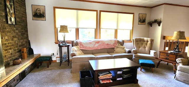 carpeted living room featuring crown molding and a fireplace