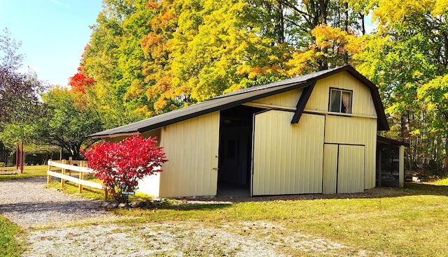 view of outdoor structure featuring a yard