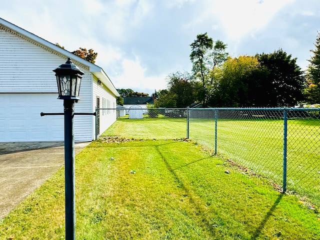 view of yard with a garage