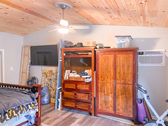 bedroom featuring lofted ceiling, wooden ceiling, light hardwood / wood-style flooring, and ceiling fan