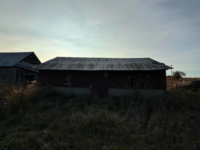 view of outdoor structure at dusk