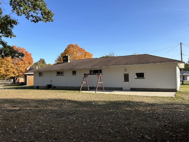 back of property with a patio area