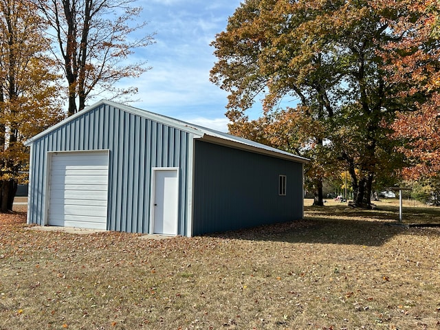 view of outbuilding featuring a garage