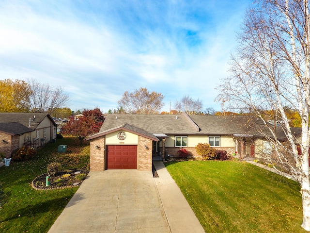 single story home featuring a front yard and a garage