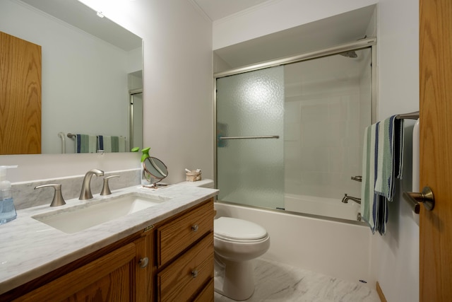 full bathroom with vanity, enclosed tub / shower combo, ornamental molding, and toilet