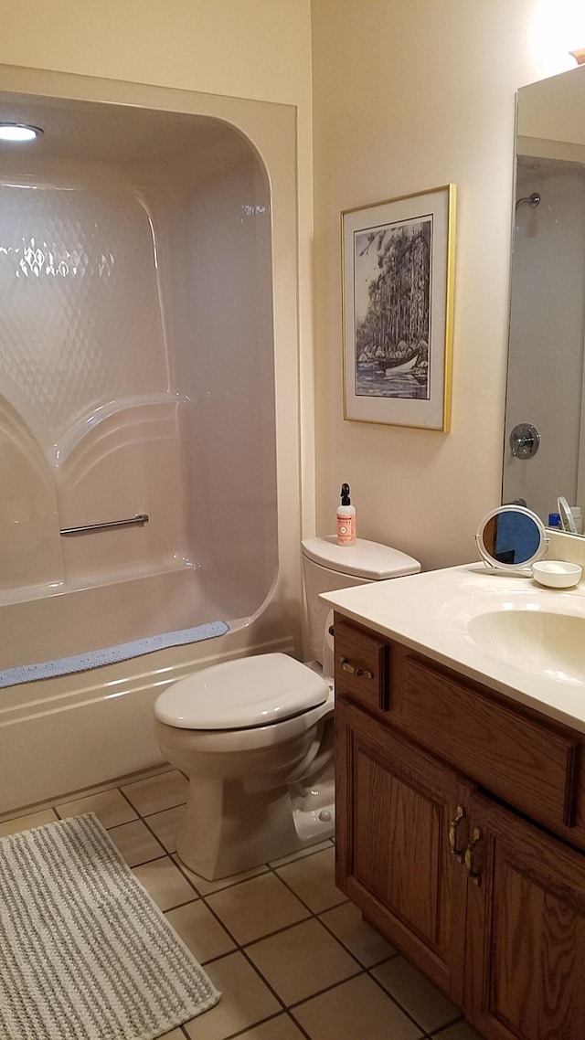 full bathroom with toilet, vanity, shower / washtub combination, and tile patterned floors