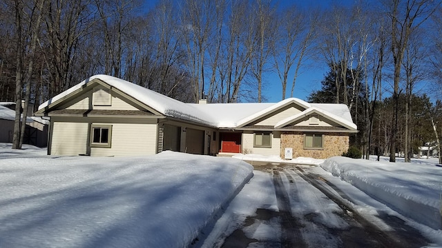 single story home featuring an attached garage