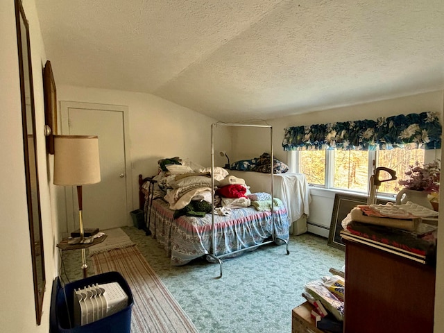 bedroom featuring a textured ceiling, carpet, vaulted ceiling, and a baseboard heating unit