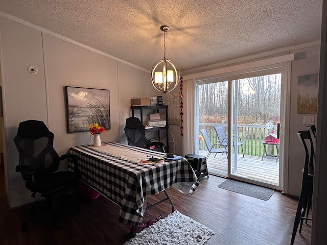 interior space with access to exterior, a textured ceiling, crown molding, hardwood / wood-style flooring, and a notable chandelier