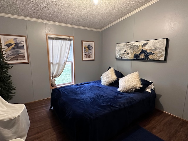 bedroom featuring a textured ceiling, crown molding, and dark wood-type flooring