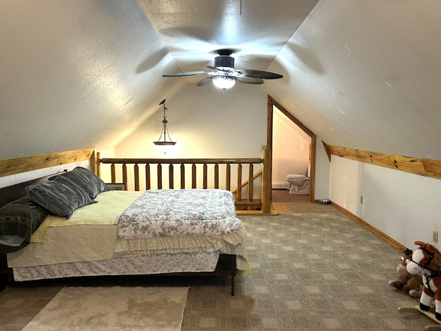 carpeted bedroom featuring vaulted ceiling, ceiling fan, and a textured ceiling