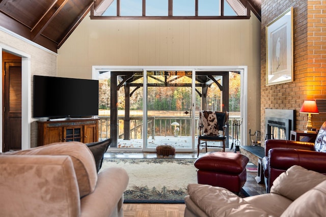 living room with wood walls, wooden ceiling, lofted ceiling with beams, a large fireplace, and parquet flooring