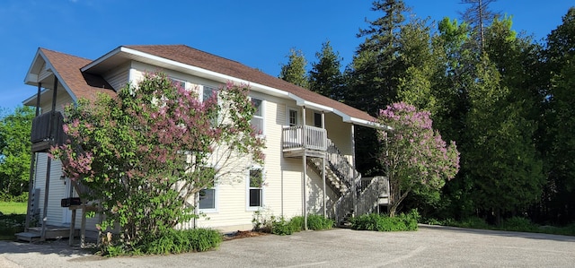 view of home's exterior featuring a balcony